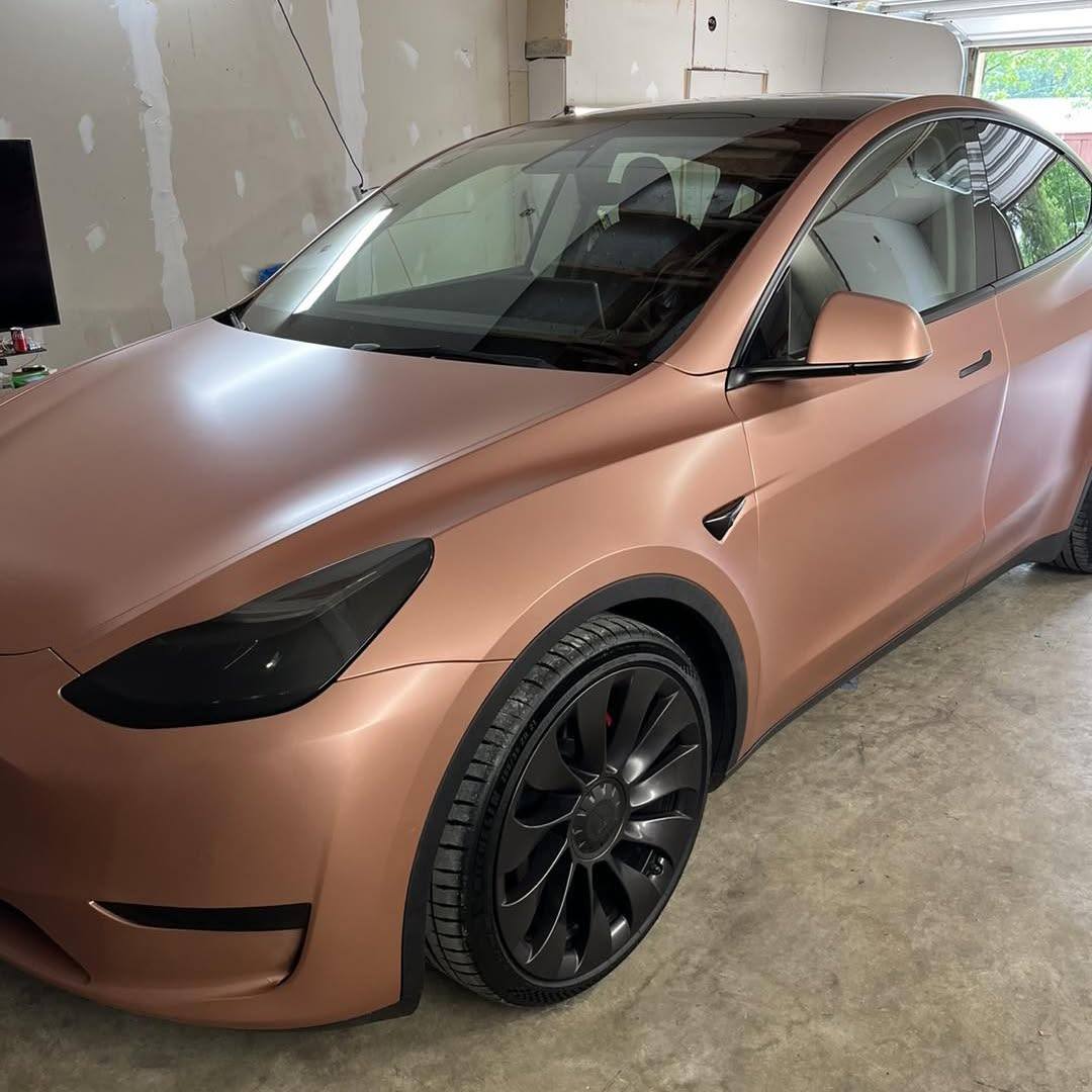 Rose-gold wrapped Model Y front